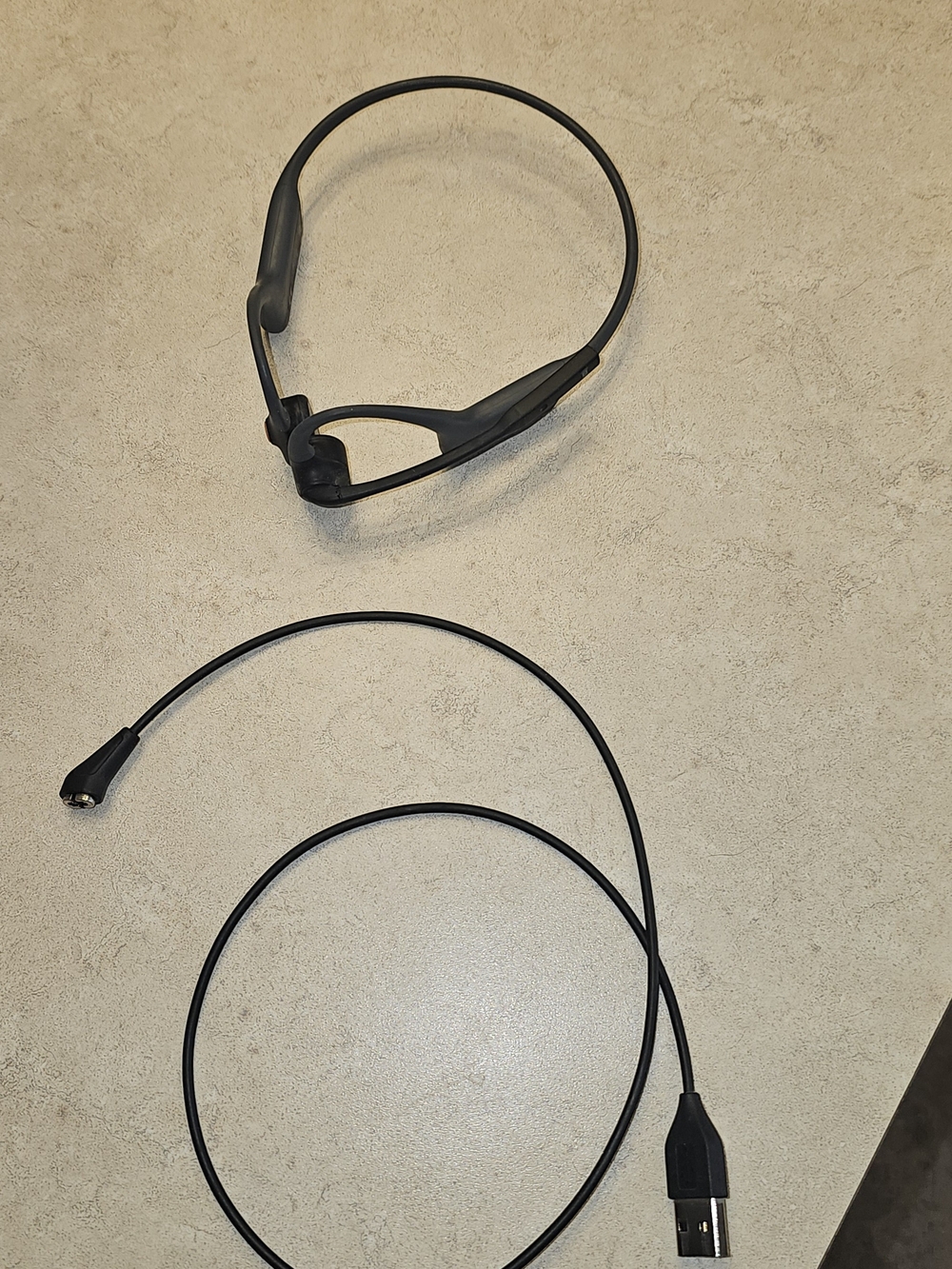Black Open-Ear Bone Conduction Headphones with USB Charging Cable